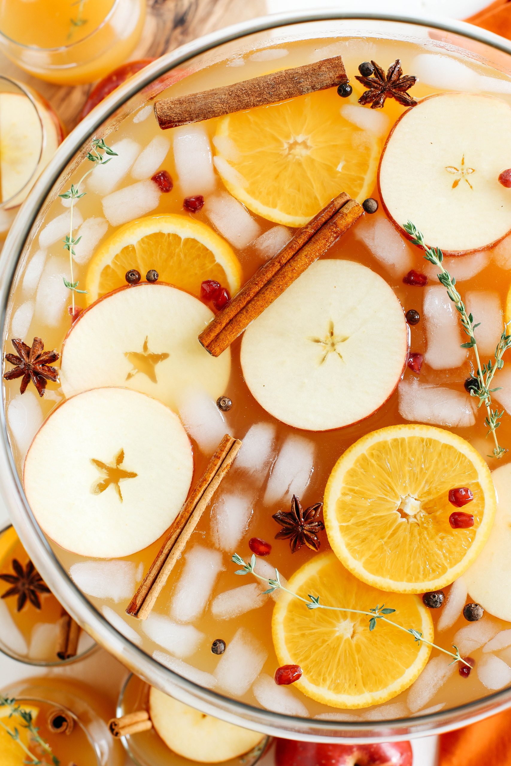 This Harvest Apple Cider Punch makes the perfect addition to any holiday party or gathering with a delicious combination of your favorite fall flavors all marinated together in one festive cocktail!